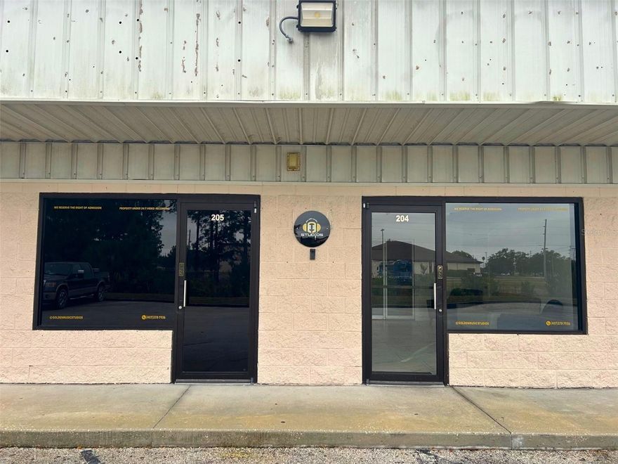 3200 sq ft office/warehouse space will be available soon!  This space is currently being used as a recording studio and meeting space. Are you looking for a great place to conduct your Podcasts or professional social media?  Leave the space as is and raise the bar on your business media!  The current tenant had combined two separate units of 3200 sqft each, however with separate entrance doors to each unit they can easily be reverted back into separate units.  This space is Unit 205 where you will enter into an inviting reception area with the professionally designed sound room to the left.  A hallway will lead you to the very tastefully decorated open area where podcasts are made and meetings are held.  There are several offices which makes this space perfect for a variety of businesses.  The two bathrooms are conveniently located by the reception area. The adjoining space, Unit 204 is listed under MLS G5105334.