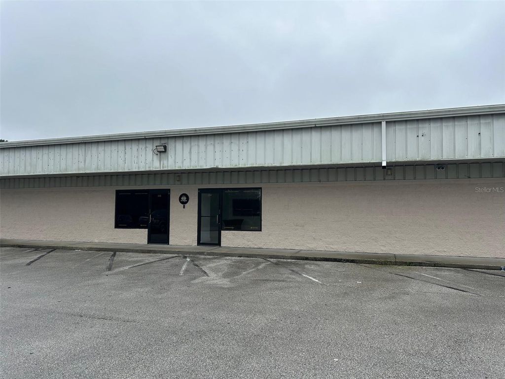 Photo of 11601 S Orange Blossom Trail #205, Orlando, FL 32837 (MLS # G5105355)