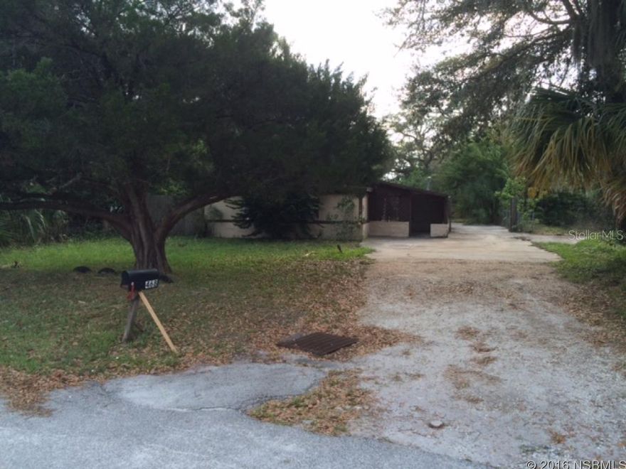 Investor or first time home owner - Hurry to get this affordable investment.This home needs some TLC and might not qualify for financing. The concrete block house is in a nice quite area (200 yards away from the Intracoastal) and has lots of potential. Big fenced yard and porch. New AC. ;Water: City