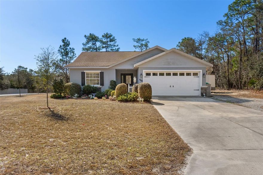 Lovely, warm, and inviting 3BR/2BA home with a 2-car garage, situated on a spacious .31-acre lot. The primary suite features two walk-in closets and a private ensuite bath for comfort and convenience. The third bedroom is currently set up as a home office with a built-in desk, which can be removed if desired.
The spacious kitchen offers an abundance of beautiful wood cabinetry, all appliances, and a gracious eat-in area perfect for everyday living. The great room features sliding glass doors that overlook the backyard and is complemented by vinyl flooring throughout the main living areas for easy maintenance.
Step outside to enjoy the large 20x20 covered patio—ideal for entertaining, grilling, or simply relaxing. A 12x24 outdoor shed on a concrete slab provides plenty of additional storage. This home offers comfort, functionality, and inviting spaces both inside and out.