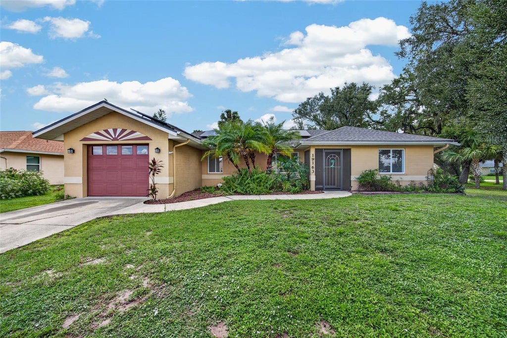 Photo of 19163 Baoy Avenue, Port Charlotte, FL 33948 (MLS # C7531104)