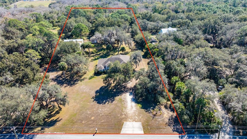 Photo of 4365 Burkholm Rd, Mims, FL 32754 (MLS # NS1087295)