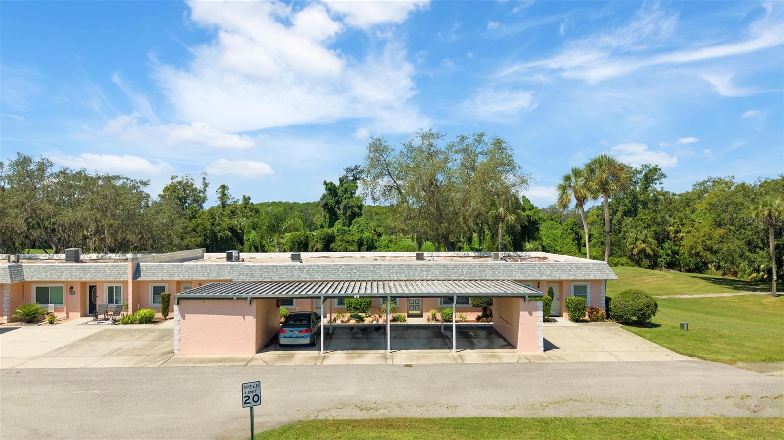 *This is in the Heart of Trinity/New Port Richey Florida* I introduce you to a Gated Community that is very active and the condo for sale is at an excellent location on the Golf Course with carport parking. The condo is clean, light & bright, 1000 sq feet with spectacular views of the Golf Course. The condo comes with 2 Bedroom, 2 Bathrooms, retractable awning on your pavered back patio, storage areas, Spacious kitchen, Some Funiture, and more. The Seven Springs Villas Section has a condo fee and it includes a lot such as Water, Sewer, Cable TV, Trash, Community Amenities, Exterior Maintenance and more. The Washer & Dryer is location near the condo and included for the units there. Have you written this address down yet? Ready to live in Sunny Florida? Want low Maintenace place to have? The floor plan gives you the kitchen on the left side as you enter, on the right is a full Bedroom and the main areas are Dining and Living Spaces and the other right-side split is the Primary Bedroom and ensuite Bath. Did I mention views of the well-maintained golf course from you living room? YES Residents here get to enjoy access year-round 2 Swimming Pools, Tennis & Pickleball Courts, Golf Course, Country Club & Restaurant, a very involved social calendar(such as Candle Making, Strength & Balance Class, Latin Dance Lessons, 18 Hole Scramble Golf Tournament, Friday Night Dinners, plus plus) "This Condo comes with a 13 MONTH CHOICE HOME WARRANTY for your Peace of Mind on AC, Water Heater, Kitchen Appliances & more to help make transitioning easier!" The Area around the condo has all the shopping you need, Medical facilities and doctors, restaurants, places of worship, and access roads to get you where you want to go. Give a Text/Call to tour and buy
