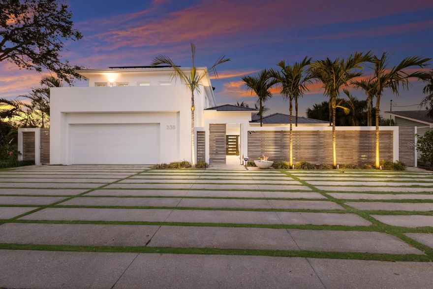 Welcome to your dream island retreat, perfectly nestled in the heart of Siesta Key’s Palm Island, just minutes away from the world-famous Siesta Beach and vibrant Siesta Village. This beautifully renovated 4-bedroom, 4-bathroom home is the epitome of coastal luxury, offering the ultimate island lifestyle where you can enjoy sun, sand, and all the amenities of this exclusive locale. Meticulously transformed by the renowned Nautilus Homes, this home boasts an open floor plan with soaring high ceilings, making it the perfect space for both relaxation and entertaining. Every inch of the property has been updated with the finest finishes and state-of-the-art features, including: 
Gourmet Kitchen with new appliances, Impact-Resistant Windows for peace of mind, New 17KW Solar System with backup generator, keeping your electric bill at an incredibly low $20-$30 per month, New Boat Lift Motors and a private dock, perfect for boating enthusiasts, 
Saltwater Pool System and spa, enclosed in a serene, waterside cage for privacy, Custom Treehouse for a fun and unique retreat, Whole House Water Conditioner and new water heater, Two New A/C Units ensuring year-round comfort, Xeroflood water barrier system installed.  Natural light pours into every room, highlighting the spacious living areas and creating an inviting atmosphere throughout. The sumptuous Primary Suite offers a private sanctuary, featuring views of the lush tropical surroundings. Step outside to your own private oasis where you can unwind by the pool, entertain in style, or take your boat out for a sunset cruise – all right in your backyard. With Siesta Key's famous restaurants, shops, and nightlife just moments away, you’ll have everything you need to experience the best of island living. This is a rare opportunity to own a piece of paradise on Palm Island, where the ultimate lifestyle meets extraordinary design and function.