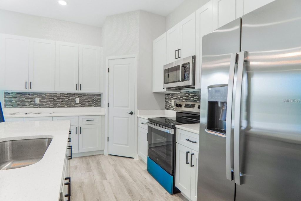 Photo of 3076 SW 168th Loop, Ocala, FL 34473 (MLS # O6371275)