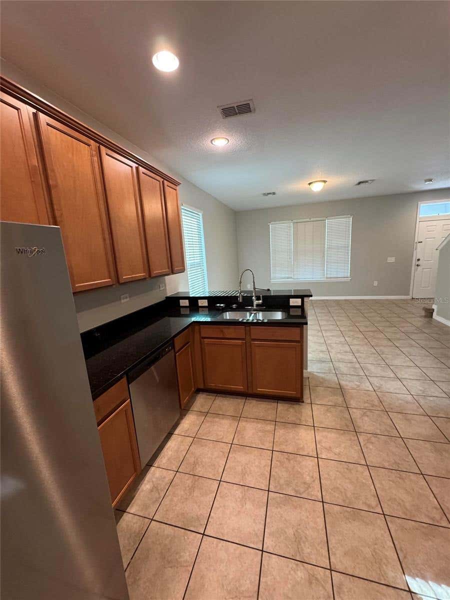 Photo of 11938 Silverlake Park Drive, Windermere, FL 34786 (MLS # O6430196)