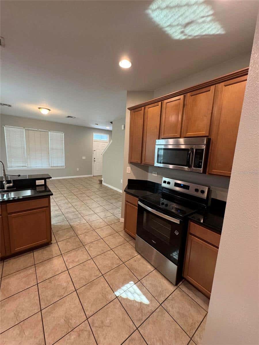 Photo of 11938 Silverlake Park Drive, Windermere, FL 34786 (MLS # O6430196)