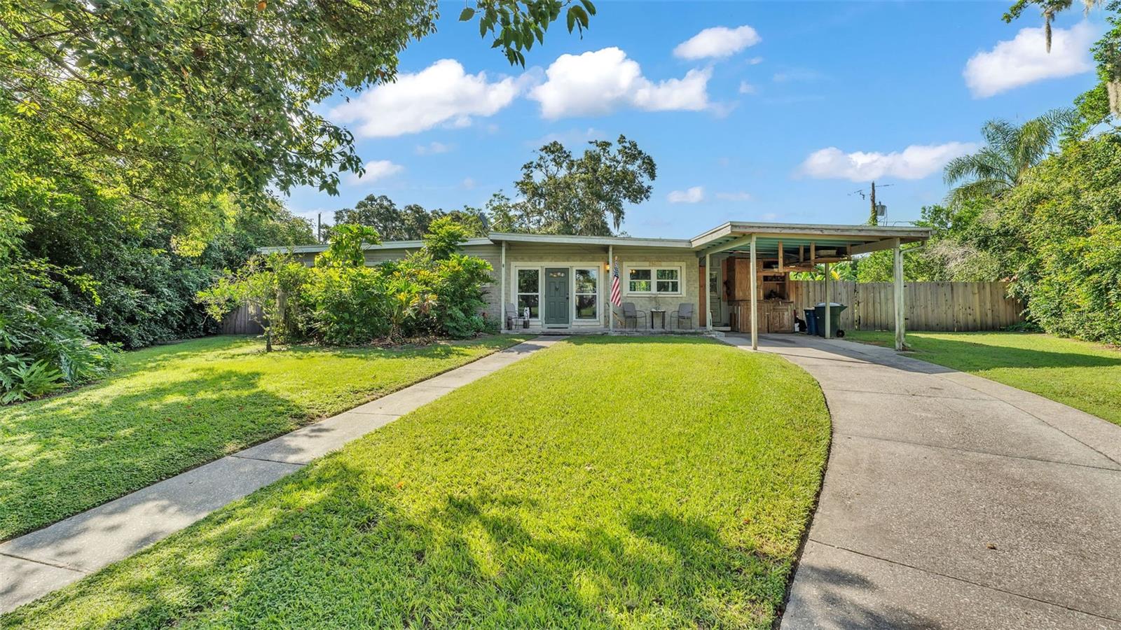 Looking for a home that’s anything but cookie-cutter? This 3-bedroom, 2-bath gem sits on an oversized, fully fenced lot and offers a rare blend of simplicity and artistic personality. Thoughtfully lived-in and uniquely styled, this home features granite countertops in the kitchen and a warm, welcoming layout that feels instantly comfortable.
Owned by a local artist, the home subtly showcases creative touches throughout—from tongue and groove wood work to cozy, colorful accents that make each space feel one-of-a-kind. The large backyard provides room to relax and enjoy the view of Lake Ruth, grow a garden, or gather with friends or family. There is plenty of space for future projects or outdoor fun.
Just down the road is Main Street Bartow which offers a glimpse into the past with its historic buildings and locally owned shops and eateries. The home is close to stellar schools and great parks as well as historic sites like the LB Brown House and the Wonder House.
If you appreciate character, value a peaceful setting, and love the idea of a home that tells a story, 1280 E Orange Blossom Circle is worth a closer look.