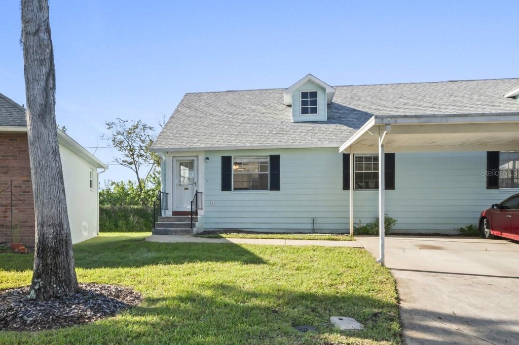 Photo of 6634 Hickorywood Ln #4A, New Port Richey, FL 34653 (MLS # W7890476)