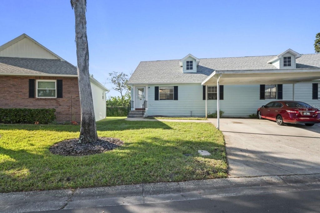 Photo of 6634 Hickorywood Ln #4A, New Port Richey, FL 34653 (MLS # W7890476)