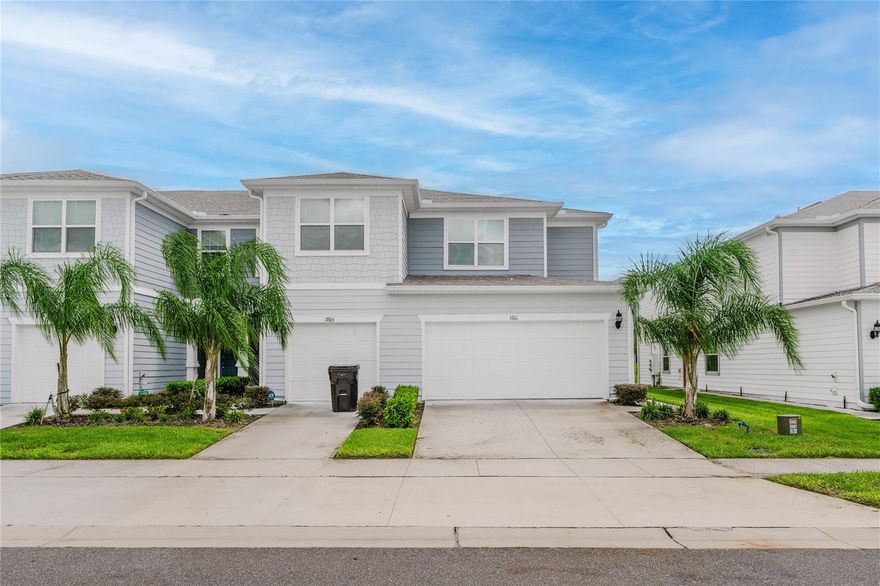 Welcome to Belle Haven! This charming townhome community in Davenport offers a prime location near Hwy 27 and Ronald Reagan Pkwy, with easy access to I-4, shopping, dining, and local attractions. This corner-unit, 3-bedroom townhome, built in 2023, features tile flooring throughout the main level and wet areas. The open-concept kitchen boasts stainless steel appliances, seamlessly complementing the spacious living area. A convenient guest half-bath is also located on the main level. Enjoy the rare dual garages and a private driveway, plus your own private patio and yard. Upstairs, the primary suite offers a walk-in closet, dual vanities, a shower, and an enclosed toilet, along with two additional bedrooms, a full bath, and a laundry closet with washer/dryer. Belle Haven residents enjoy a community pool and amenities, and the rent includes lawn care. This beautiful townhome offers both comfort and style—schedule your tour today!