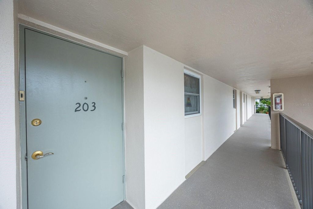 Photo of 9945 47th Ave N #203, St Petersburg, FL 33708 (MLS # TB8480581)