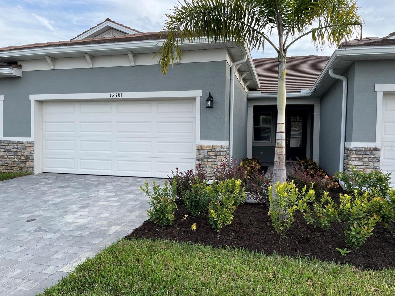 Discover this spotless, move-in-ready villa located in Sunstone at Wellen Park. It's just minutes from downtown Wellen Park, offering both convenience and modern living. This Anclote model home has 1,501 square feet of thoughtfully designed space with a clean, modern look.
When you walk in, you'll notice how bright and open it feels, thanks to large sliding glass doors that lead to a covered outdoor area. The kitchen features stainless steel appliances and a counter-height bar—perfect for hosting—alongside a dining area that connects to the living room.
The private main bedroom includes a large walk-in closet and a bathroom with two sinks. The second bedroom has its own full bathroom and is close to the laundry room for added convenience. The third bedroom can be used as an office or an extra guest room.
The spacious two-car garage has plenty of room for cars, bikes, beach gear, or extra storage.
This like-new villa is in a great location and comes with access to Sunstone’s resort-style amenities, including a beach-entry pool with lap lanes and a spa, a clubhouse with a fitness center, pickleball courts, a dog park, and indoor/outdoor gathering spaces. Only additional payment is electric.
Available furnished or unfurnished.