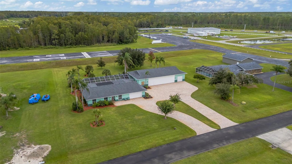 Photo of 11610 Pilot Country Drive, Spring Hill, FL 34610 (MLS # TB8552652)