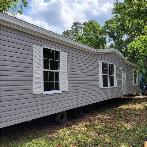 Photo of 2459 Ayerswood Drive, Brooksville, FL 34604 (MLS # T3309660)