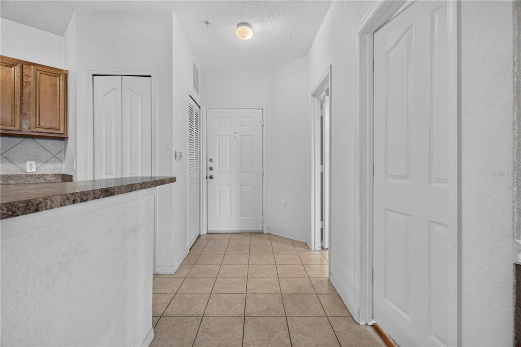 Photo of 6149 Metrowest Boulevard #308, Orlando, FL 32835 (MLS # O6450104)