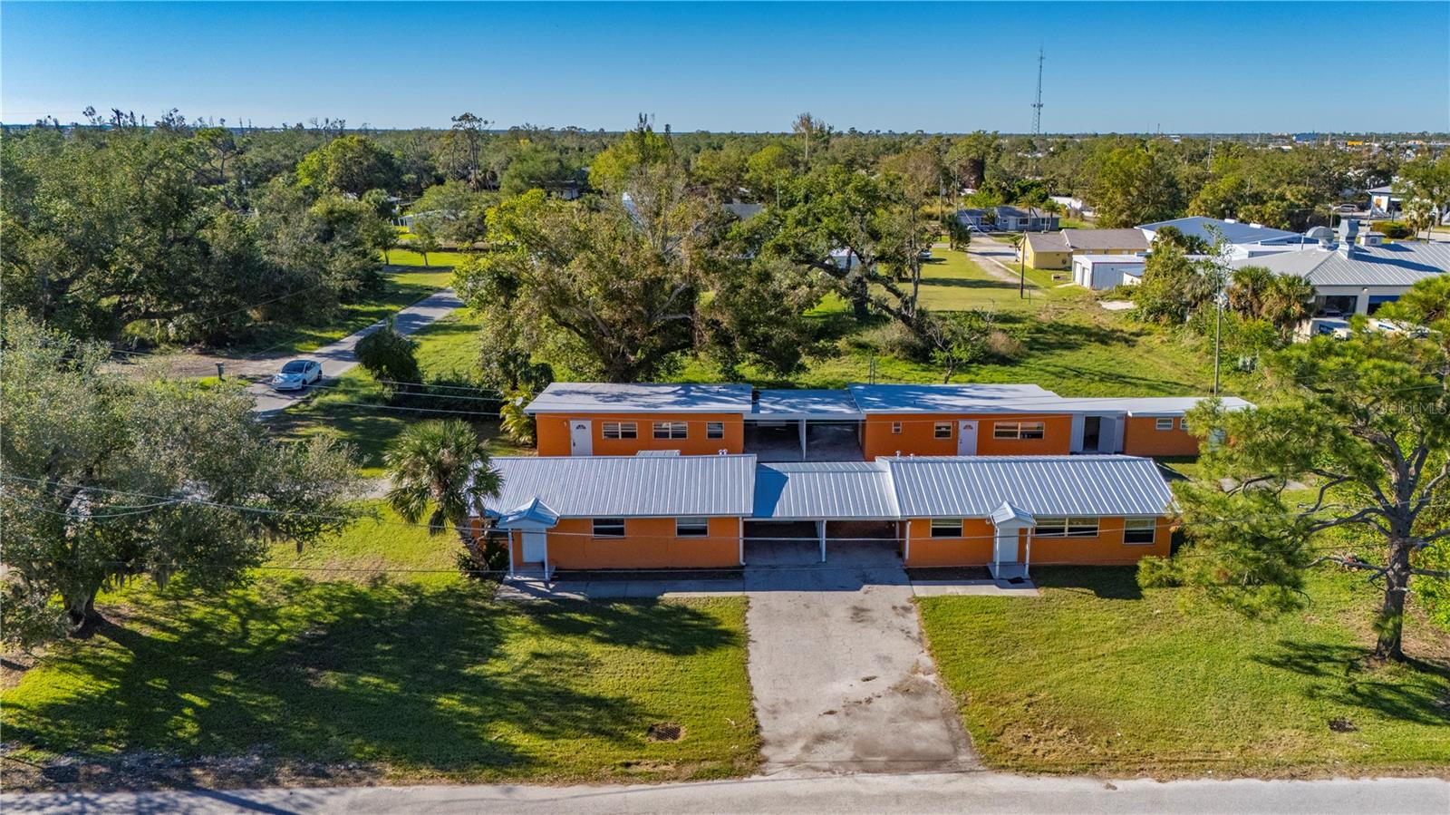 Quadruplex with Metal Roofs and is Located in a good Rental Area of Charlotte Harbor. All units Recently flooded by Hurricane Milton, some drywall has been removed. *****The Property is being Sold AS IS***