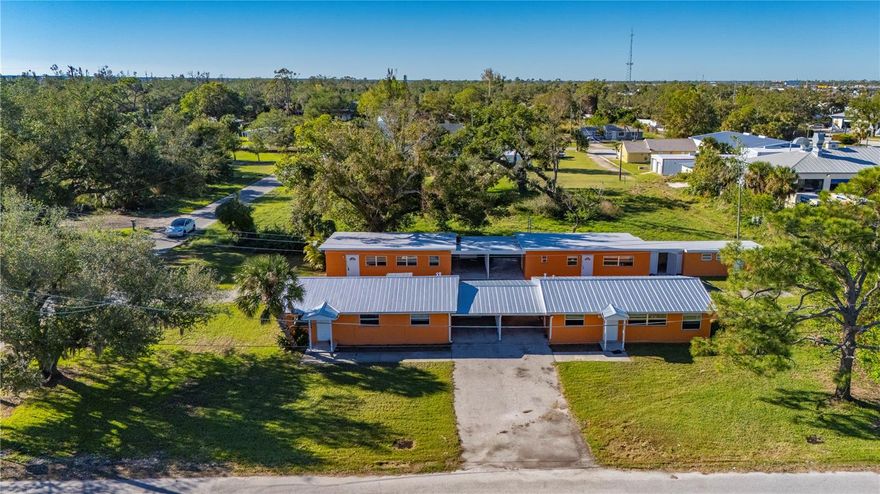 Quadruplex Zoned Charlotte Harbor Mixed Use, offering endless Rental Possibilities and is priced Below the Appraised value which will allow for the repairs needed. All Units have Metal Roofs, the 4plex has a Separate Laundry Room for the units and there is a single Car Garage which would allow for additional Storage for the 4plex.  This Property can been seen from US41(Tamiami Trail) and is Located in a good Rental Area of Beautiful Charlotte Harbor,  and is close to Sunseeker Resort, Charlotte Harbor/Peace River, the Kings Highway/Tamiami Trail corridor, Harborview, along with great Shopping, lots of Dining options, and all that Southwest Florida offers and more. This 4plex, prior to Hurricane Milton, brought in approximate $46,800 a year in Rental Income, which was lower than the market****The Property is being Sold AS IS, and is ready for you to re-finish and get your rental income started.