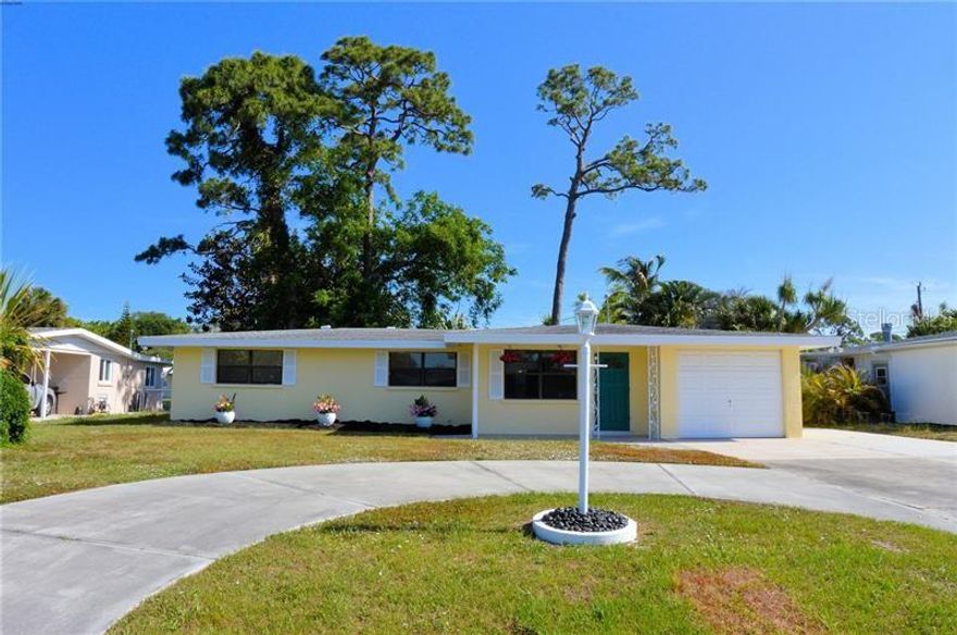 Enjoy the coastal lifestyle in this Florida home located in TROPICAL SHORES, a WATERFRONT COMMUNITY on Little Sarasota Bay close to fabulous shopping, dining and Siesta Key! Modernized three bedroom/two bath single family home in the most convenient spot near everything Sarasota! Just 1 mile to #1 Beach Siesta Key, Shopping, Restaurants, Publix, and more. So close to everything you can walk or bike and still be there in minutes. A short drive to Downtown Sarasota or to hop on I 75. Living Area: Live comfortably and conveniently in this one-story home with three spacious bedrooms and two full baths. The living room is light and bright that opens to a large fenced-in backyard, Perfect for entertaining, barbecues and so much more! The kitchen includes all appliances, dishwasher, over-range, refrigerator-freezer and microwave. Three spacious bedrooms with two full baths, featuring a nice, walk-in master shower and tub/shower combination in guest bath. Tenant Responsible for: Electric, Water/Sewer, Cable/Internet. Homes come fully furnished. All you need is to bring your toys and you are good to go!
