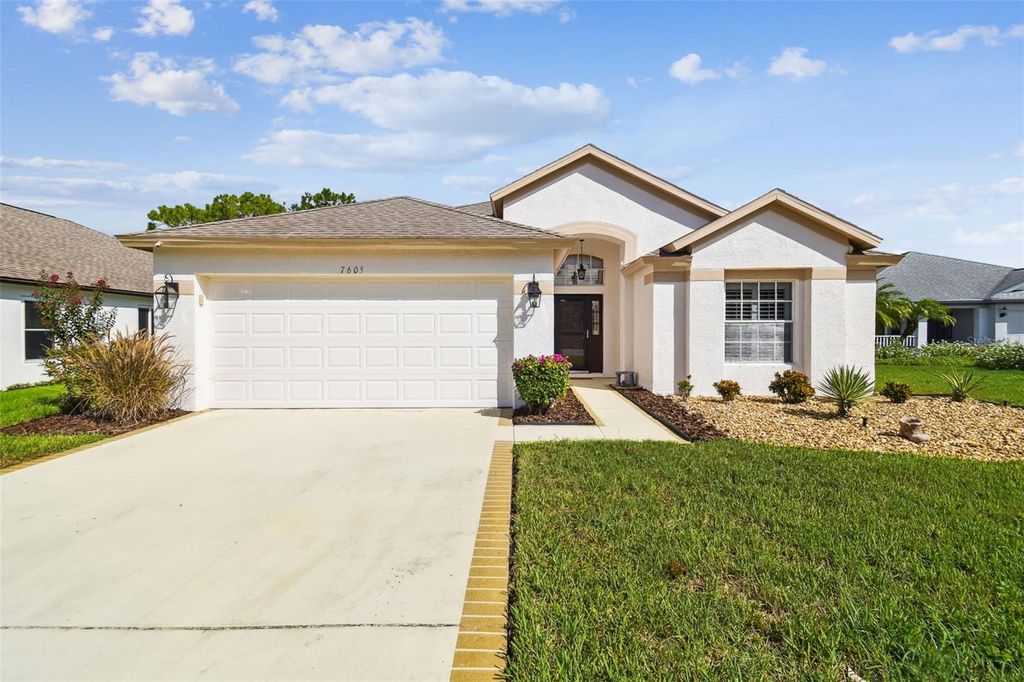 Photo of 7605 Kinnow Court, Land O Lakes, FL 34637 (MLS # W7877743)