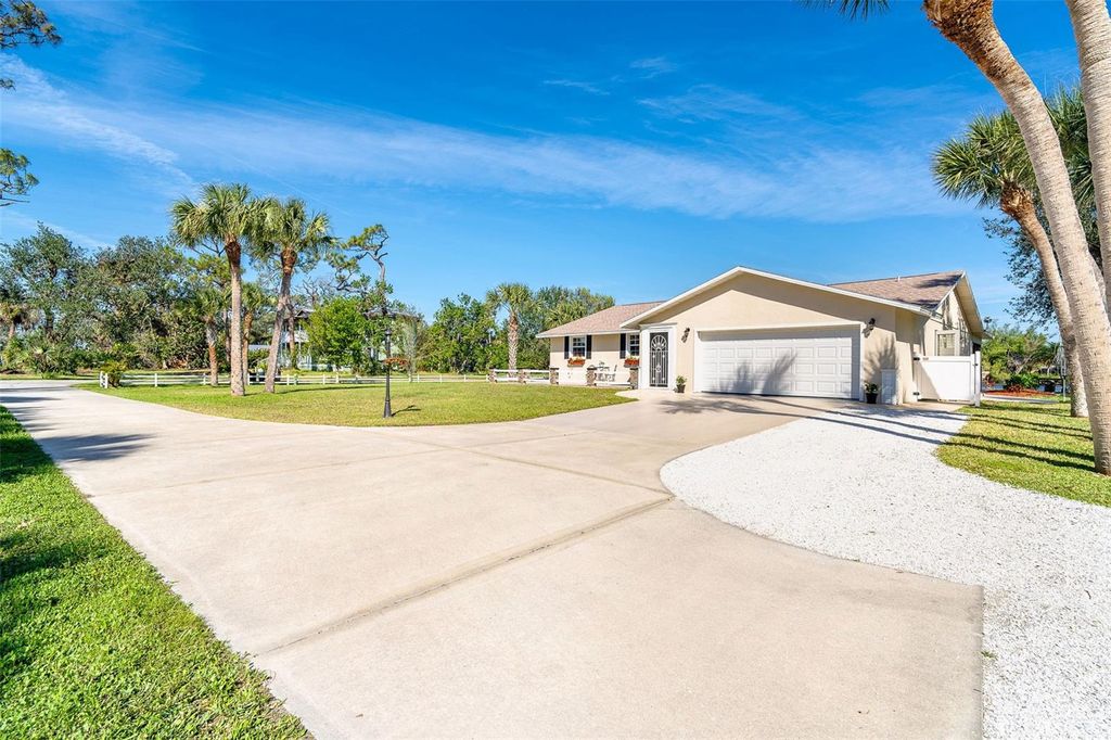 Photo of 891 Harmony Lane, Englewood, FL 34223 (MLS # D6144499)