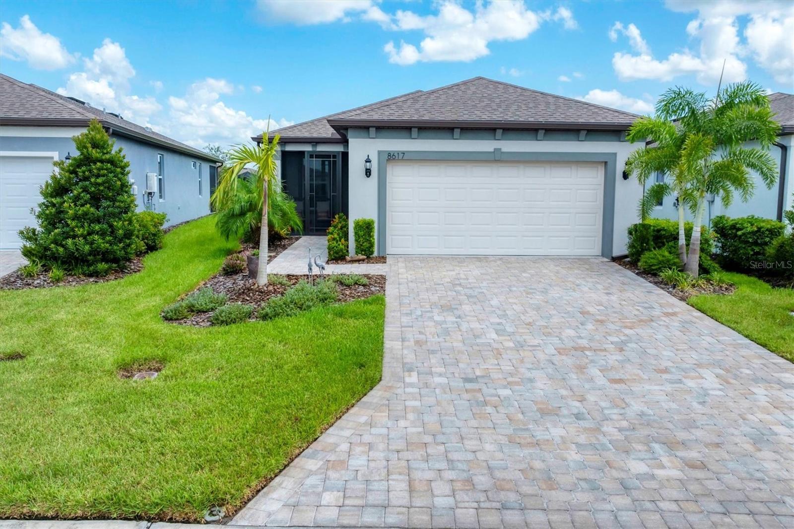 This Contour floorplan home was meant to be the forever home for sellers but then a bigger floorplan became available in the community they love, and they took a leap and purchased it! What you cannot see is the 4ft garage extension with top shelf epoxy flooring and plenty of room for storage. Inside the loveliest finishes are sure to delight. The double-door den with Murphy bed provides a private third bedroom for extended family visits. The guest bath has a walk-in shower (no tub). The luxurious vinyl wide plank flooring is soft under foot and easy to clean. The primary bedroom suite is large and flows beautifully. The covered and screened lanai and birdcage provides soothing views of green spaces and conservation. Located in the heart of the community and available for a quick turnover to new homeowners to love. Del Webb Bay View is 1,5 miles off I-75 providing amazing access to St Pete, Tampa, and Sarasota. The Bay View community is amazingly active and a wee bit competitive with sports. Warm and welcoming and with a restaurant on site, you will love living here!