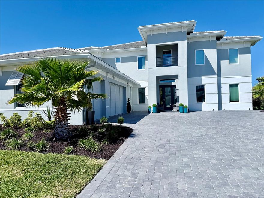 NEW CONSTRUCTION, Fully Decorated like "MODEL HOME", READY TO MOVE, great location, 1.7 miles Downtown  Windermere 6.5  miles Dr Phillips, 3.2 miles to Winter Garden Village 6 miles from Winter Garden Farmers Market, 12 miles to Disney,  prestigious gated community of only 34 residences. offering the perfect balance of privacy and accessibility. The home itself effortlessly blends contemporary design with elegant modern coastal style, offering a true sense of exclusivity.
2 luxurious master suites, each featuring custom-designed built-in furniture and wallpaper that not only enhance the home's personality but also maximize functionality. The master suites offer an unparalleled level of comfort and privacy, with one located on the first floor and the other on the second floor, both featuring spacious "his-and-hers" walk-in closets.
The home is fully smart, controlled by both app and voice commands, providing convenience and modern living at the touch of a button.
Designed with an active lifestyle in mind, the home includes a state-of-the-art private gym, perfect for daily workouts or unwinding after a busy day.
Step outside into your very own oasis — a meticulously crafted outdoor living area that includes a gourmet kitchen with a pizza oven, ideal for entertaining guests. The rare lap pool is a standout feature, catering to both swimming enthusiasts and those who simply wish to unwind in luxury.
Other exceptional features include a spacious three-car garage and a generous driveway, providing ample space for hosting gatherings, special events, or simply relaxing with family and friends.
With every detail thoughtfully considered, this home offers not just a place to live, but an elevated lifestyle.