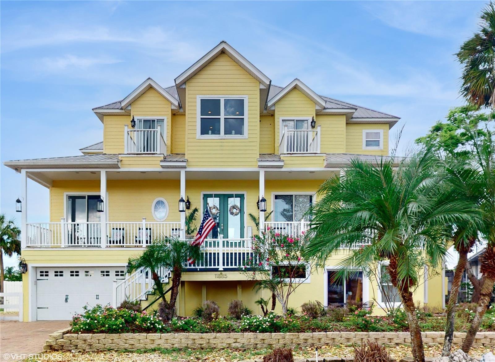 Oh you will want to pay attention to this Opportunity! Price is right! Floor plan is Right! Time is right! Scallop Season is almost here! Imagine YOUR beautiful waterfront paradise, with YOUR boat on the water just steps from YOUR back door! Ready for YOUR next adventure.! Package is $450k UNDER current appraised Value! 2025..New 2nd floor HVAC, New Elevator , New 3rd floor HVAC ! This listing is for HOME (11885) & adjoining, buildable vacant lot (11905) with new sea wall! Total of 160' of water frontage for your Estate! INCREDIBLE VALUE!! This Spacious, 3 level, 3 bedroom, 4 1/2 bath, Key West Inspired waterfront home has something for everyone! Make it your Primary Home! Perfect 2nd Home! Mix it up with Personal Vacations and VRBO rentals! Strictly investor? This home would be a great income stream for you! PLUS don't forget the vacant lot! Designed to have a water view from every room in the home, multiple balconies to enjoy the sunrise or the sunset! The entire rear of the 1st floor is finished with beautiful sliding glass doors, view of the navigable canal, patio with pavers, fire pit, splash pool, tiki hut, dock, 10k lb boat lift, 2 jet ski lifts, Swings & more. The ground floor, has tremendous garage space, storage space, room for indoor/outdoor type of furniture & game tables! Full Kitchen, new appliances, spacious granite counter tops & bar! Perfect setup for entertaining on this level. Several Mini splits for AC on the ground floor (Central HVAC systems for each of 2nd & 3rd floors) You can choose to go to the 2nd & 3rd floor via the beautiful Staircase made of Coral from Key West or, in your private Elevator! On the second floor you will find the family room with beautiful views and a welcoming gas fireplace. The 2nd kitchen, dining room , laundry room, 1/2 bath, Master bedroom with ensuite bathroom & walk-in closet, are also on the 2nd floor. Oversized Balcony along the rear of the 2nd floor with gorgeous water views, windows stretching from the 2nd floor up the Cathedral Ceiling to the 3rd floor! Beautiful glass entry doors on the 2nd floor, opening to the Front porch & exterior staircase On to the 3rd floor, you will find 2 spacious bedrooms with ensuite bathrooms & walk out balconies. This floor includes a cozy den, with water views in both directions. The 3rd floor has an oversized balcony, gorgeous water views, coffee bar/wet bar, Roof added to this balcony in '22! Gorgeous trims & fixtures throughout. This lifestyle can wash the stress away! From your backyard, board your boat and a quick ride to enjoy dining at a waterfront restaurant! or to the Springs! To the Gulf! To the sandbar for a "floating" kind of day! Commuter? Easy access to I-75, SunCoast Pkwy. 1 hr to TIA, Stadiums, Malls, Gulf Beaches, etc. Local Beaches & Springs 10-15 min away! Need more bedrooms? The Den on the 3rd floor could easily become another bedroom! This home was created with thoughtful planning, ample storage & many amenities So Many options waiting for YOU! A MUST see! As we know, the 2024 hurricane season was hard on the West Coast of Florida, There was some water intrusion on the ground level, it has been professionally repaired...& that has inspired the seller to make the ground level an indoor/outdoor type of space... a gift to the future owners... the home is now as it should be & what Mother Nature prefers! Seen it before? You want to See it Again! All information is deemed to be accurate, however, cannot be guaranteed.