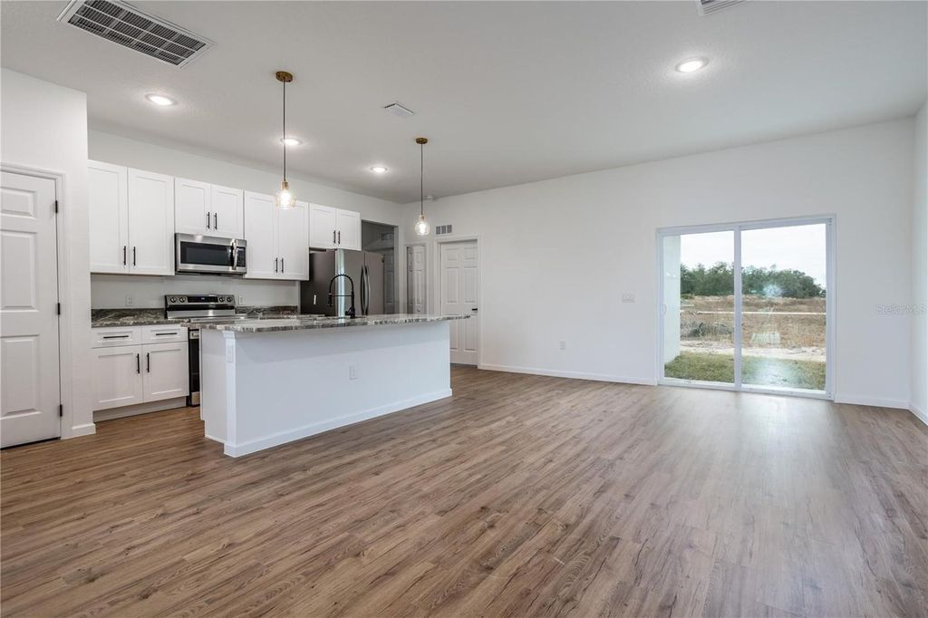 Photo of 411 St Johns Lane, Kissimmee, FL 34759 (MLS # O6364689)