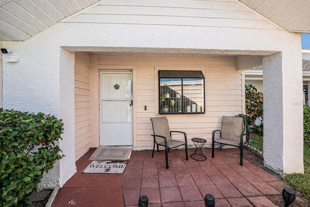 Photo of 10736 Laquinta Drive, New Port Richey, FL 34654 (MLS # TB8472806)