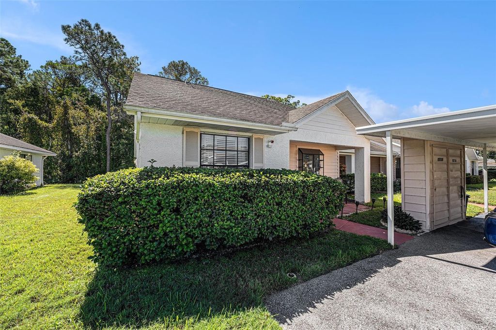 Photo of 10736 Laquinta Drive, New Port Richey, FL 34654 (MLS # TB8472806)