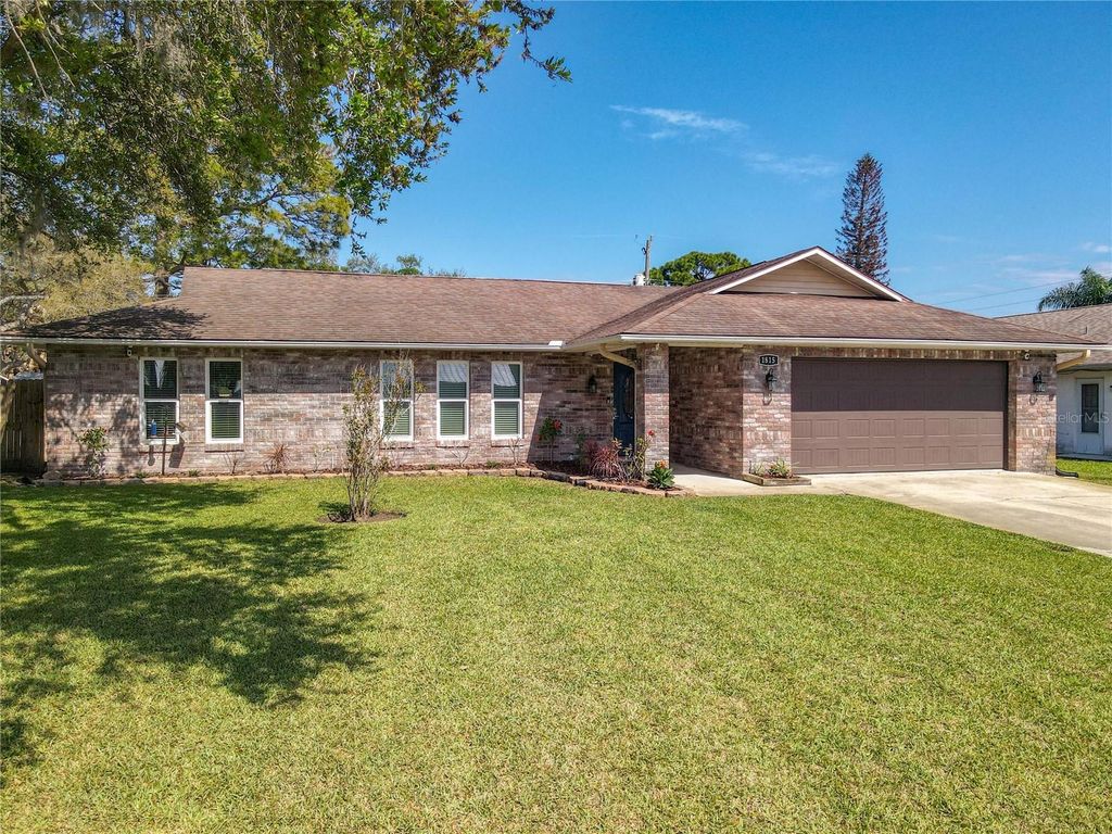 Photo of 1815 Travelers Palm Drive, Edgewater, FL 32132 (MLS # O6394246)