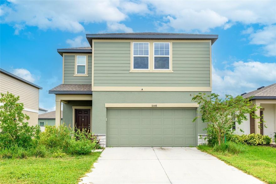 Step into this 2023 Starlight Homes two-story haven with high ceilings and natural flow throughout. A welcoming entry leads to the kitchen with granite counters, stainless appliances, 30" cabinetry, a corner walk-in pantry, and island sink with disposal. Enjoy a dining space and living room that connect for relaxed everyday living. Five bedrooms with walk-in closets, including one on the main level, plus four full baths, upstairs lounge, and laundry up top. A large loft on the second floor is versatile - this could be a second living room, media room, playroom, or office! Thoughtful touches include hurricane shutters, window coverings, and a 2-car garage. Community perks: gated resort-style pool, fob entry, splash area, playground, and pet-friendly vibes. A polished, easygoing place to settle in and spread out.