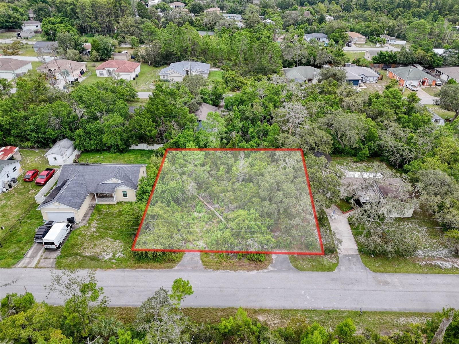 You’ve found the perfect lot to bring your vision to life. This rare .27-acre triple lot on Tinley Road offers the ideal setting for both builders and future homeowners. With a preserved area directly across the street, you’ll enjoy a forever view of Florida’s natural beauty without the worry of future development blocking your outlook.
Set on a paved street and surrounded by attractive new construction near the sought-after Waters Edge community, this property blends neighborhood appeal with long-term value. Builders will appreciate the oversized dimensions and investment potential, while homeowners will love the opportunity to design and build their dream residence in a setting that offers both privacy and convenience.
The location could not be better — minutes from the new Ridge Road extension for easy commuting, close to shopping, dining, and schools, and with quick access to Moon Lake Road leading to Moon Lake Park, where boating, kayaking, and fishing await.
Opportunities like this are rare. Whether you’re a builder seeking your next project or a family ready to create your forever home, this exceptional lot offers the space, setting, and location you’ve been waiting for.