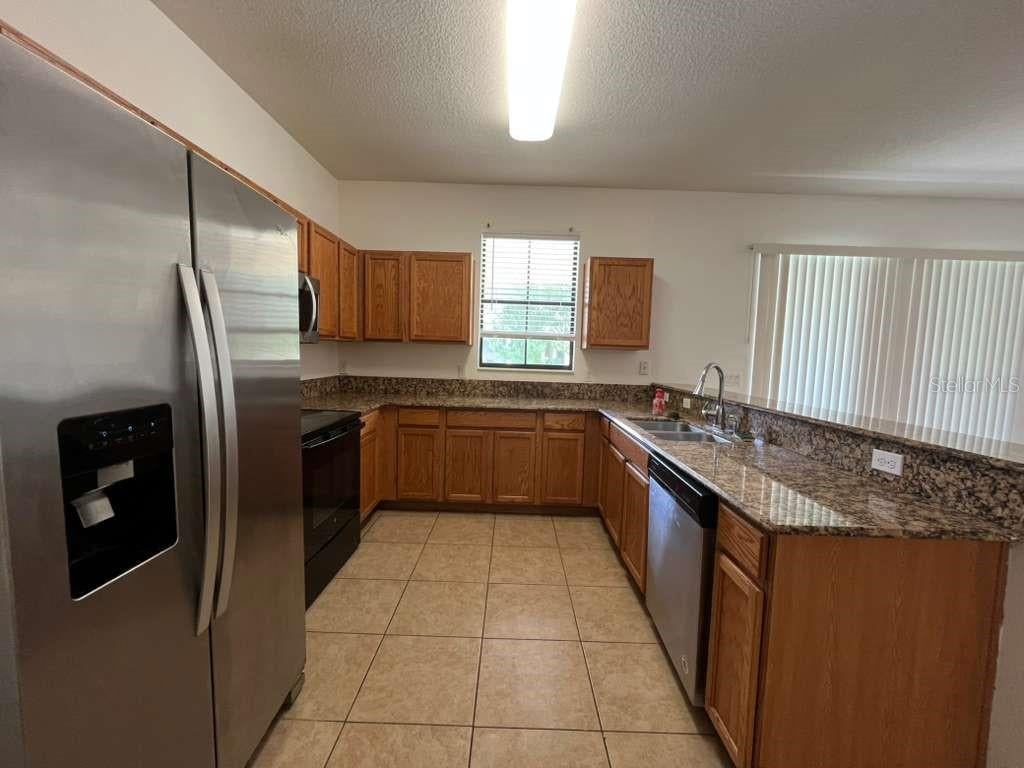 Photo of 1712 Portofino Meadows Boulevard, Orlando, FL 32824 (MLS # S5156784)