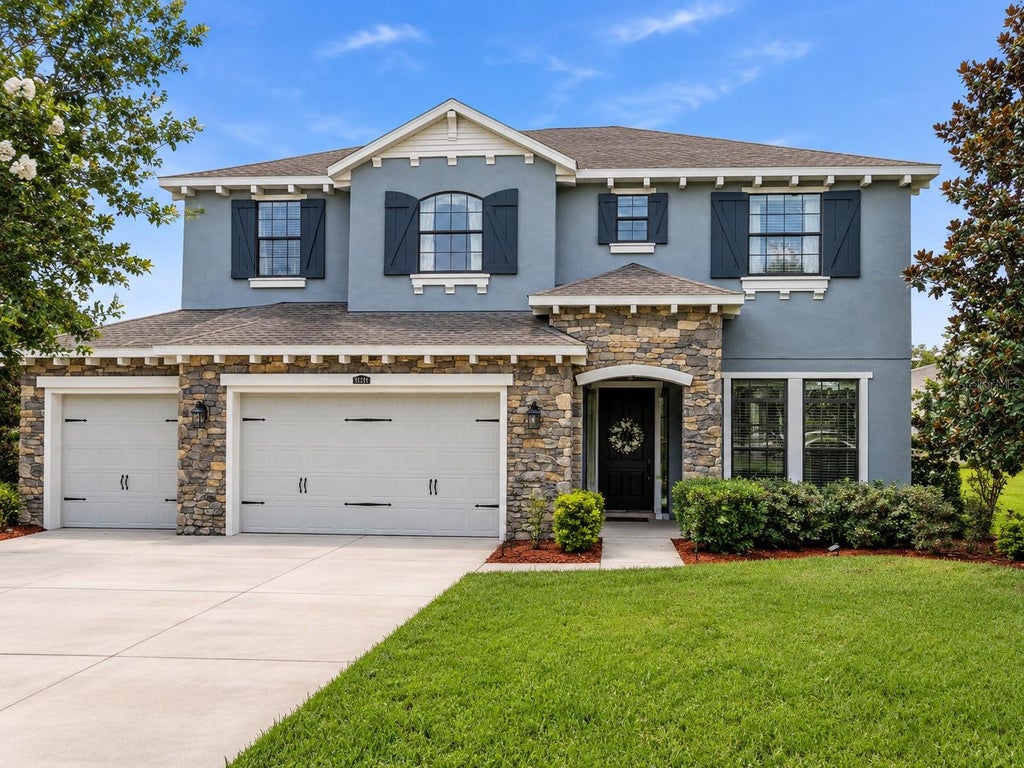 Photo of 17909 Howsmoor Place, Lutz, FL 33559 (MLS # TB8521809)