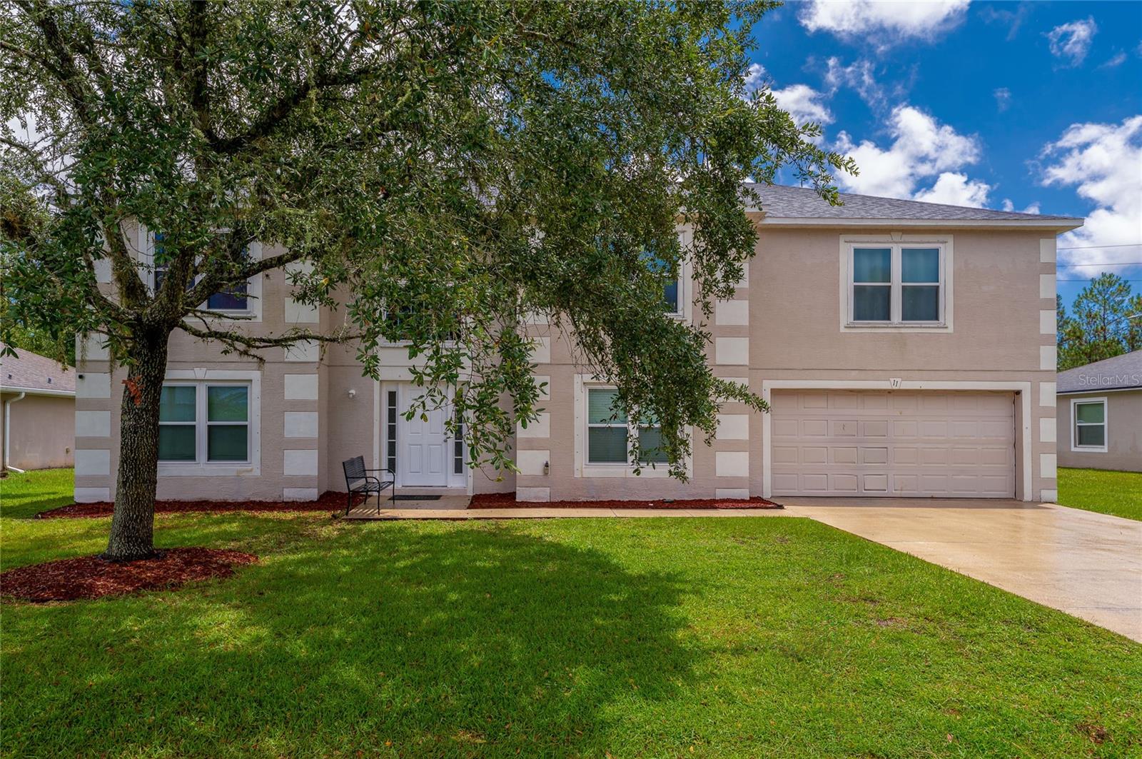 Spacious and move-in ready home boasts 5-bedroom, 2.5-bath in desirable Quail Hollow! This 2-story property offers almost 3000 sqft of flexible living space, including a downstairs flex room and half bath—perfect for a home office or guest room. Dedicated dining area, open-concept kitchen overlooking the family room with direct access to the backyard. The fully vinyl-fenced yard is a blank canvas—build your dream pool, she shed, or outdoor kitchen! Upstairs features 5 generously sized bedrooms and 2 full baths, including a spacious primary suite with en-suite. Loft can be used as media center, game room, office...you name it! Located just minutes from US-1, SR-100, and approximately 8 miles to Flagler Beach! 2-car garage. No HOA. Schedule your private tour today!