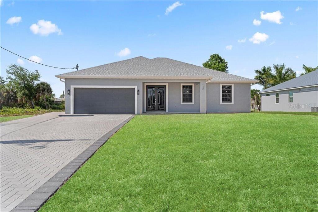 Photo of 7427 Sea Mist Drive, Port Charlotte, FL 33981 (MLS # C7531557)