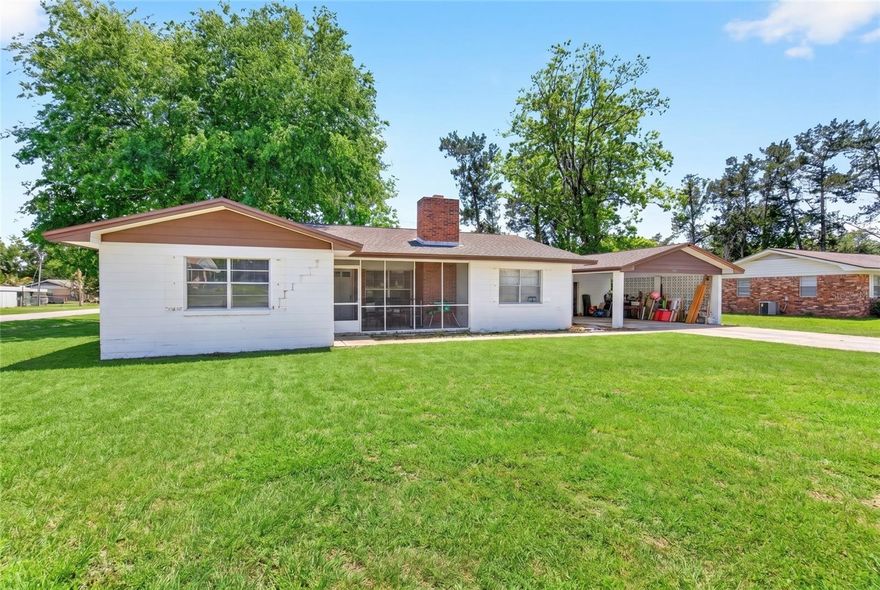 One or more photo(s) has been virtually staged. NO HOA, .32 ACRE LOT, Concrete Block home ready for your finishing touches! Home has 2022 30 year architectural shingle roof, 2025 Hvac, 2011 hot water heater, and kitchen has 2026 sink,refrigerator,oven,stove, and dishwasher. Electric updated as well as drain pipes. 
Covered entry leads to spacious living room needing floors finished(flooring on site), to left of the front door is the 2nd living or den, to right of living room is the dining area overlooking the kitchen and inside laundry room. 2nd and 3rd bedrooms share vintage tan bath with combo tub/shower, and vanity ready for updating but functional. primary sits in left back of home and primary bath is ready for your finishing style with new sheetrock 2026. Back across the home through living room with 2 sided fireplace to the kitchen out to the screened in breezeway leading to oversized carport and storage area home to well with filter. All electrical replaced including new meter and Generator plug just waiting for your portable generator.  10 x 10 shed has power and is currently a gym. Home sits on a crawl and has a radon pipe. New septic field lines. Time to build sweat equity!! Most of home needs new flooring, trim work and paint, small items to call it home!