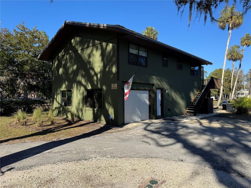 Income producing property, New windows, new sliders, and new exterior doors. New AC. New water softener treatment. New well. Deep water dock allows Yacht up to 70’ or multiple smaller boats. 1st floor set up for easy flood repair if required. All block walls on first and no drywall under 4’. Includes fixtures and decorations. Airbnb can do $50k plus a year. House already extremely booked and highest rated/most booked in area. . Waterfront home with deep water access on the Withlacoochee River. Beautiful view of the river. No bridges, direct to the Gulf of Mexico. Beautifully landscaped yard. Downstairs has a wonderful bar, with a large room, great for gatherings with family and friends. Access to the river from downstairs and upstairs. Upstairs has a wonderful screened porch over looking the river, perfect for enjoying your coffee in the mornings and watching the shrimp boats going out in the evenings. The downstairs has a large screened in porch with access straight out to the yard and boat dock. The front yard over looks a private pasture. The fishing along this river is amazing, red fish, snook, tarpon, fresh water bass and more. Easy access to boat ramps, shopping, dining, boating, kayaking, golfing, hospitals, Gainesville, Ocala, Dunnellon and Crystal River. If you have a private plane, there is an airport in Crystal River and Dunnellon. Windows were all done in 2023 and AC is 2023 also. There is a shed on the property for all of your gear to be stowed away.