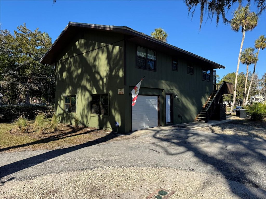 Photo of 16645 W River Rd, Inglis, FL 34449 (MLS # OM725269)