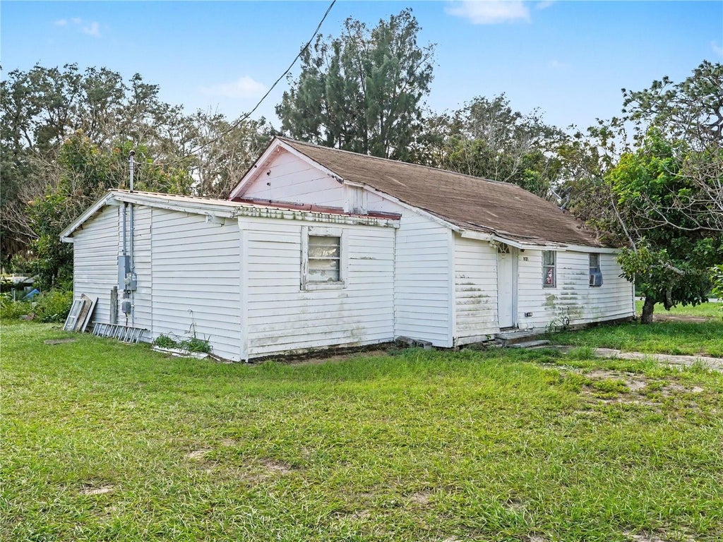 Photo of 921 W Cornell Street, Avon Park, FL 33825 (MLS # TB8562666)