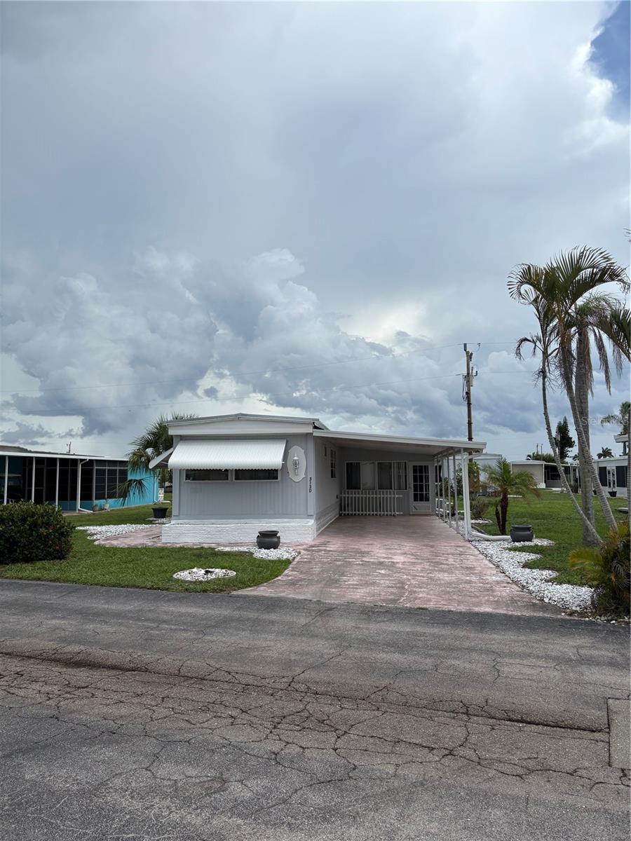 This beautiful well maintained fully furnished single wide with an additional enclosed room sleeps 6 or more. This home has 1 full bath and a half bath. It is located in the desirable Tamiami Village 55 and over, pet friendly community. This lovely community has 2 pools, library, shuffleboard, pickleball, billiards, horseshoes, clubhouse, exercise room and other activities for you to enjoy. It is conveniently locatednear Hiway 41, close to all the attractions of Fort Myers and Cape Coral has to offer. You canlive in this lovely home all year round or part time and rent it out if you desire. This home includes a high in demand certificate worth $22,000 which gives you lower monthly fees, vested interest in the community and voting rights. The park's common landry is one street over or there is room to add a washer and dryer, you will just need to add the washer and dryer hook-ups.