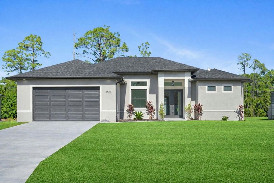 MOVE-IN-READY, NEW CONSTRUCTION. This home features 3 bedrooms, 2 bathrooms + office. You're going to love all of the high-end finishes that were chosen with luxury in mind. From paver driveway to ALL IMPACT doors and windows. As you enter the home you're greeted by spacious ceilings and a large triple impact slider that draws your attention to the oversized lanai, featuring a large backyard. You'll love the oversized 10ft island in your beautiful kitchen with upgraded stainless-steel appliances and a closeted pantry for all your culinary needs. Your main bedroom features high ceilings and walk-in closet with a master bath featuring double showers with glass and two modern vanities. Of course, we have to mention the upgrades that make this home unique: upgraded appliances package, expanded hall ways, tray ceilings, plumbing for outdoor kitchen, recessed A/C unit in garage, extended garage to fit any size car / truck, glass doors in den, and even a Nest thermostat to control climate from your phone!