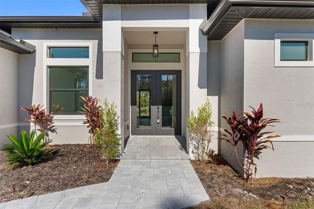 Photo of 1566 Knotty Pine Avenue, North Port, FL 34288 (MLS # D6145328)