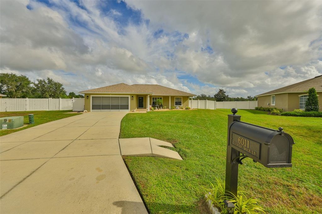 Photo of 6011 Country Walk Lane, Winter Haven, FL 33880 (MLS # TB8436663)