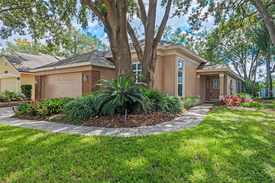 Check out this beautifully maintained 3-Bedroom 2-Bath Home on a Corner Lot with Screened Porch & Community Amenities. As you drive up you're immediately welcomed by the well-manicured yard, majestic oak trees, and a brick paver driveway that enhances the home’s charming curb appeal.  Step inside to find elegant crown molding, neutral paint tones, and an open layout designed for comfortable living and effortless entertaining. The kitchen features rich wood cabinetry, Silastone countertops, a breakfast bar, closet pantry, and a seamless flow into the family room—complete with stylish plantation shutters. The spacious, combined living and dining room opens directly to the screened back porch, perfect for indoor-outdoor living. Enjoy the privacy of a split bedroom floor plan, with the primary suite offering private access to the back porch, a generous walk-in closet, and a spa-like en-suite bath with dual sinks, a step-in shower, and soaking tub. Two other bedrooms and a full bath along with a linen closet are located on the opposite side of this home. The dedicated laundry room includes a washer and dryer for your convenience. The garage offers shelving for storage and a small work bench. Sellers are providing a NEW ROOF 2025, to be completed prior to closing! Additional highlights include HVAC 2020 and a low-maintenance lifestyle with a low HOA that covers front and side grass cutting, as well as access to a community pool. Outdoor enthusiasts will love the location—just minutes from multiple parks including Trotwood Park, scenic bike/walking trails, and the Tuscawilla Country Club which offers golf, tennis, and a café. This home truly offers the perfect blend of comfort, location, and lifestyle. Don’t miss your chance—schedule your private tour today!