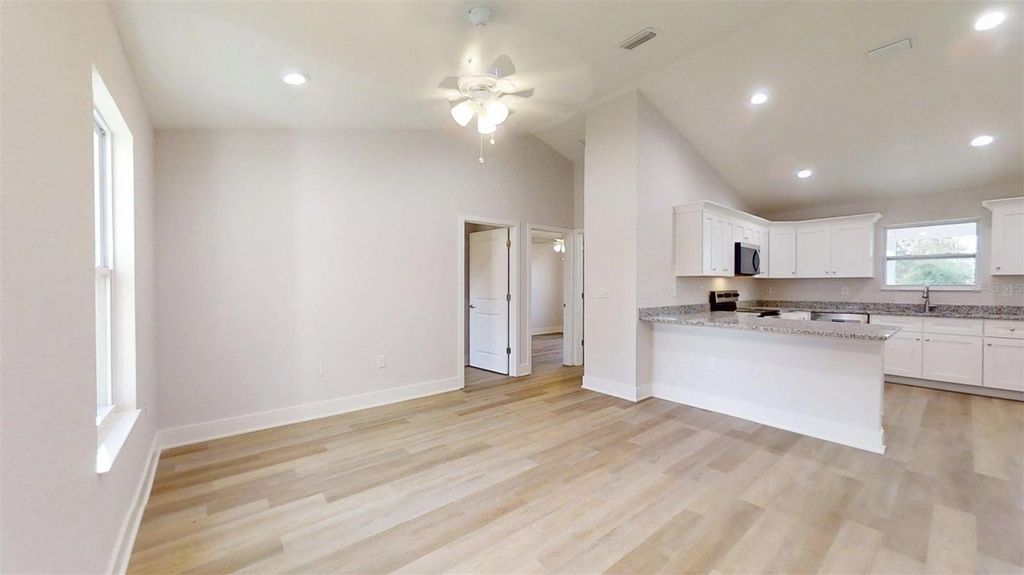 Photo of 24159 NW Banyan Lane, Dunnellon, FL 34431 (MLS # OM715109)