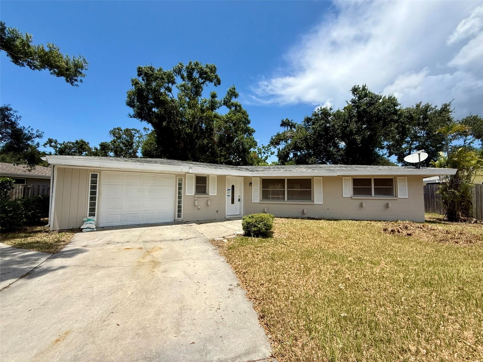 Arlington/Hyde Park Charm! Discover this nicely updated 2-bedroom, 1.5-bath single-family home perfectly situated in the highly desirable Arlington/Hyde Park area of Sarasota. With just under 1,400 sq. ft. of living space (2,183 sq. ft. total under roof) and an almost ¼-acre lot, this home offers room to relax, entertain, and enjoy the Florida lifestyle to the fullest. Features & Updates include: Brand New HVAC System & Thermostat – Comfort and efficiency year-round; New Smoke Detectors for safety and peace of mind; New Hot Water Heater; New Luxury Vinyl Plank Flooring in all living areas and bedrooms – stylish, durable, and low-maintenance! Freshly Painted Inside & Out – crisp, clean, and ready for your personal touch! Updated Rear Screened Deck – a massive wood deck with a full screen cage, featuring new lumber to replace older weathered boards – perfect for outdoor dining, lounging, or entertaining. Interior Highlights include: Spacious open living areas filled with natural light; two comfortable bedrooms with brand new LVP flooring; one full bath plus a convenient half bath just off the kitchen area; indoor laundry area with hookups for an electric dryer and washing machine! Exterior & Lot features include: one-car attached garage plus a large multi-car driveway with a turnout for easy parking; large front lawn with lush grass and curb appeal; fully fenced backyard with expansive grassy area – ideal for pets, play, or gardening... plenty of space to add a pool, garden, or other backyard features! Lock in this prime Sarasota location today... just minutes to Gulf Coast Beaches for sand and surf lovers; close to shopping, dining, medical care, Sarasota Memorial Hospital, and downtown Sarasota; and easy access to cultural attractions, entertainment venues, and vibrant nightlife! Built in 1962, this home combines mid-century charm with modern upgrades, making it an exceptional find for full-time residents, seasonal owners, or investors! Don’t miss this move-in ready gem in one of Sarasota’s most sought-after neighborhoods! Schedule your showing today. Please submit a financing pre-approval or proof of funds with all contracts. Offered As-Is with the right to inspect.