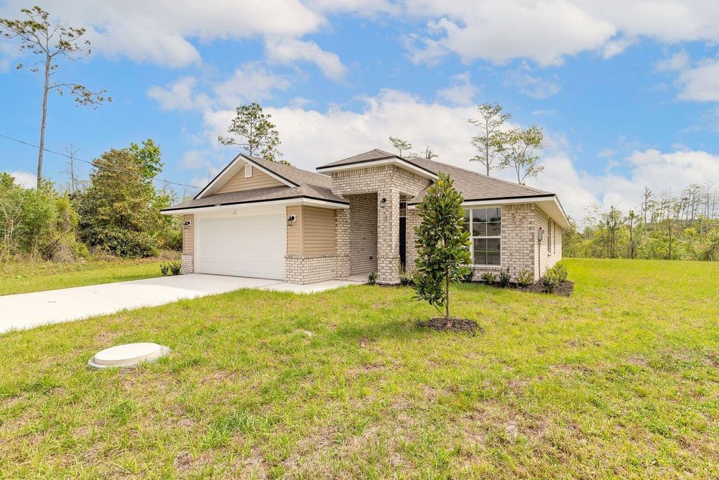 Photo of 18 Squadron Place, Palm Coast, FL 32164 (MLS # FC317494)